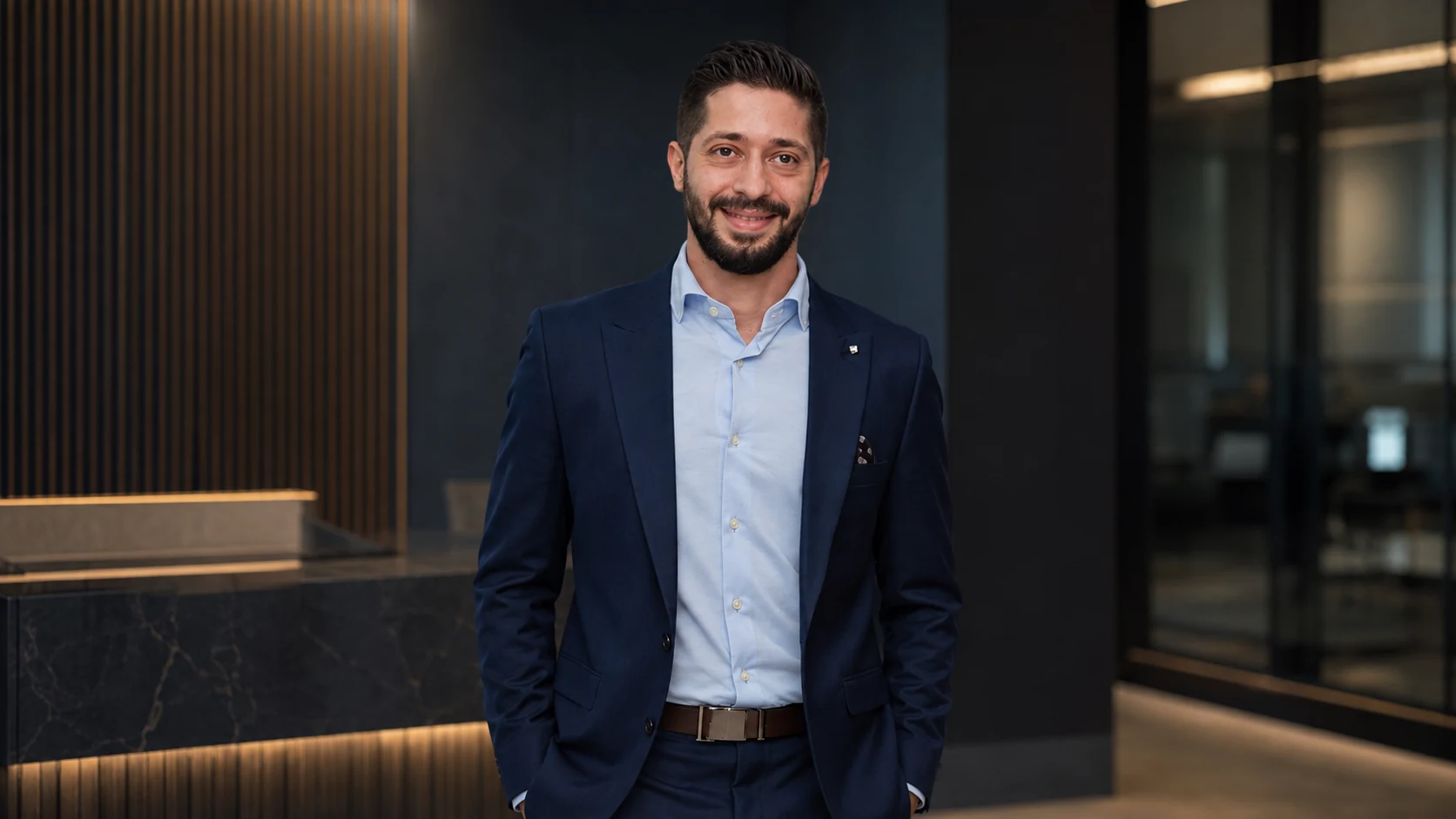 Ahmad Waleed in a luxury corporate environment, representing his journey from television production to brand-building leadership.